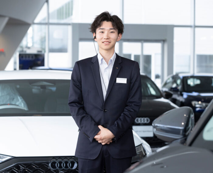 「憧れ」を「プロの誇り」へ。新人営業がAudiという至高の一台を届けるまでの挑戦。